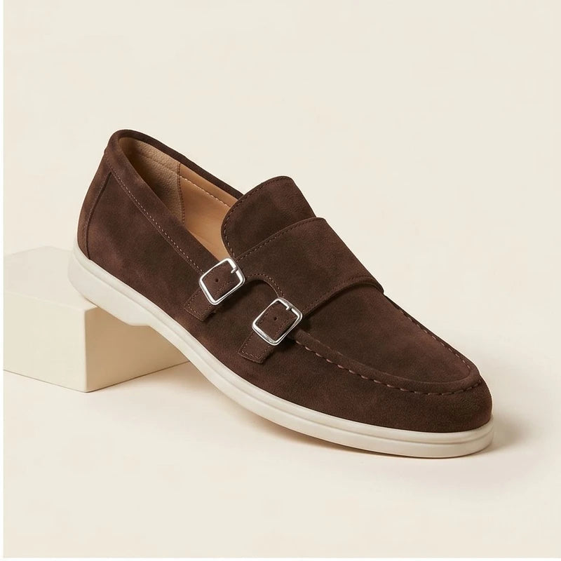 Brown suede double monk strap loafers with silver buckles.