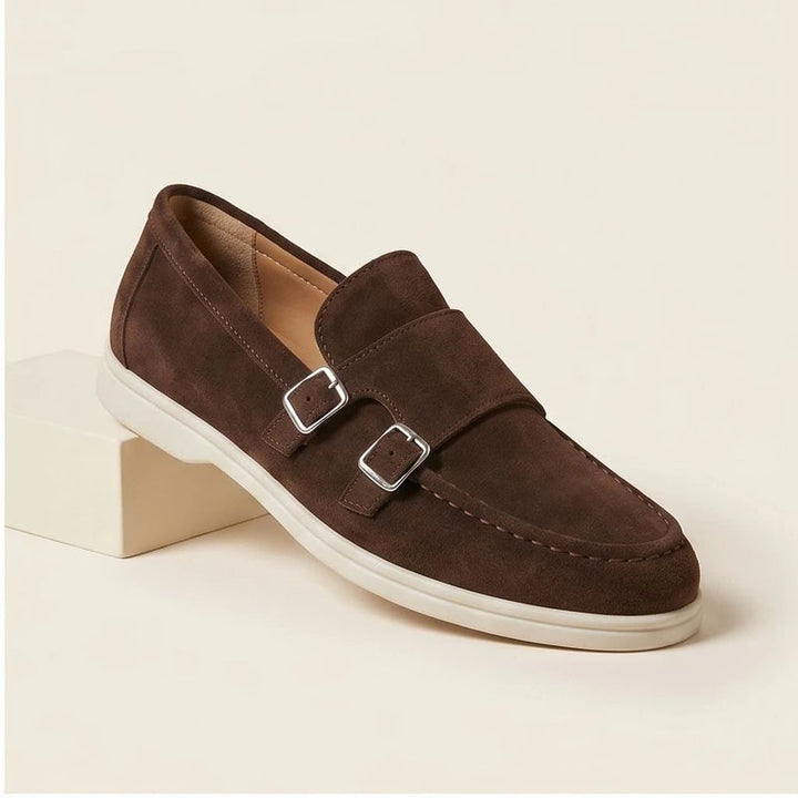 Brown suede double monk strap loafers with silver buckles.