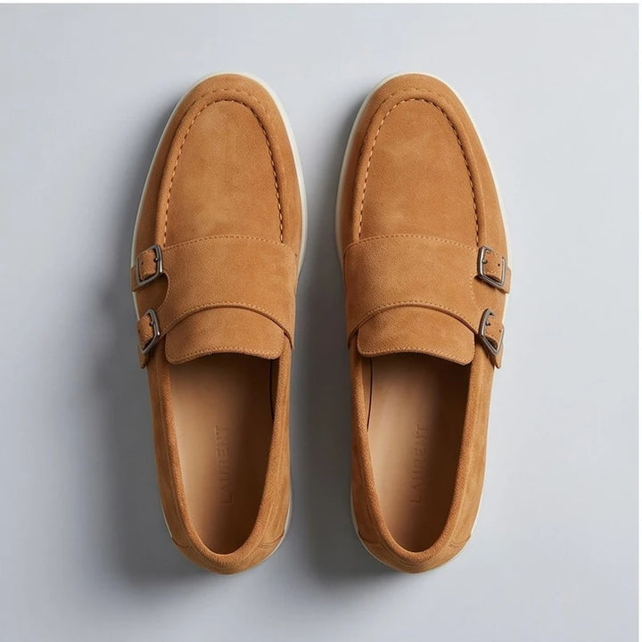 Tan suede double monk strap loafers with buckles.