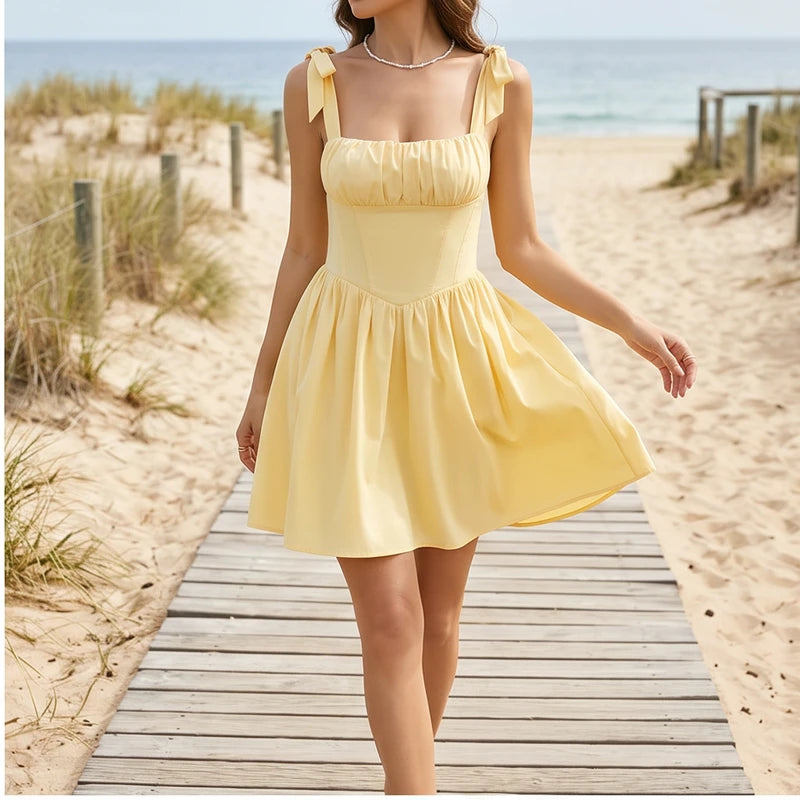 Model wearing M Solara Tie-Strap Yellow Mini Dress outdoors - 2