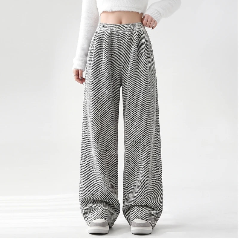 Model wearing Light Gray knit apparel in a studio