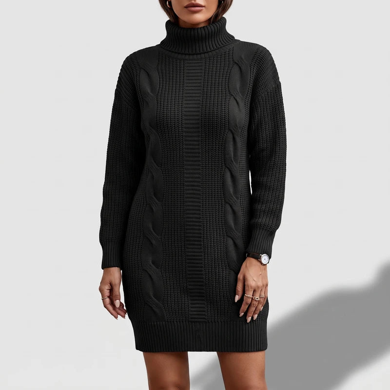Black knit dress on an off-gray studio background