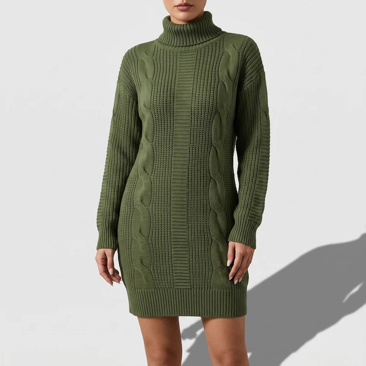 Green knit dress on an off-gray studio background