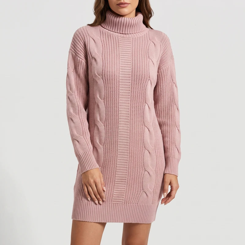 Pink knit dress on an off-gray studio background
