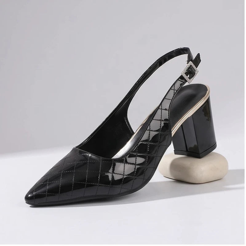 Black heel in a studio background