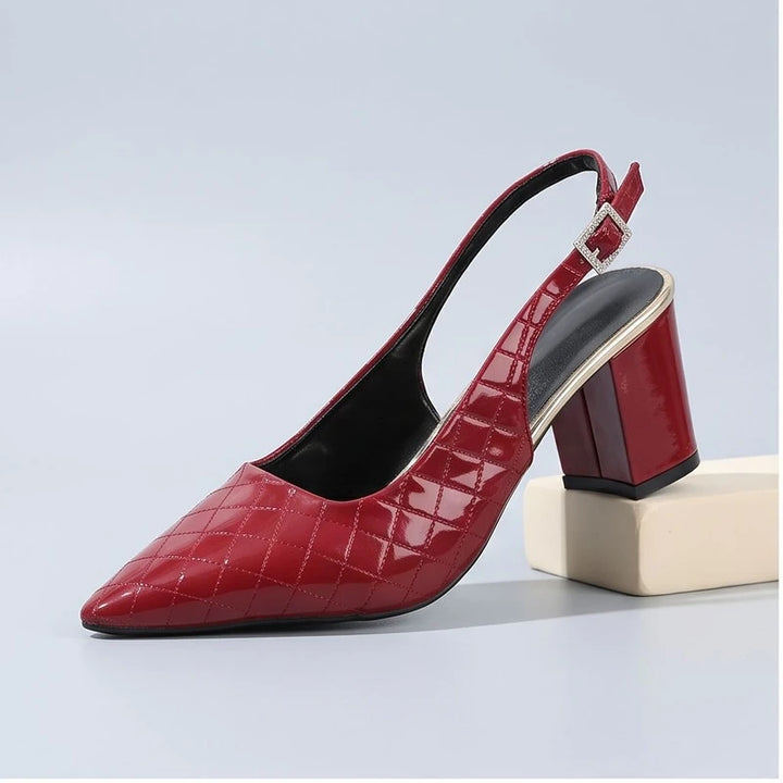 Red heel in a studio background