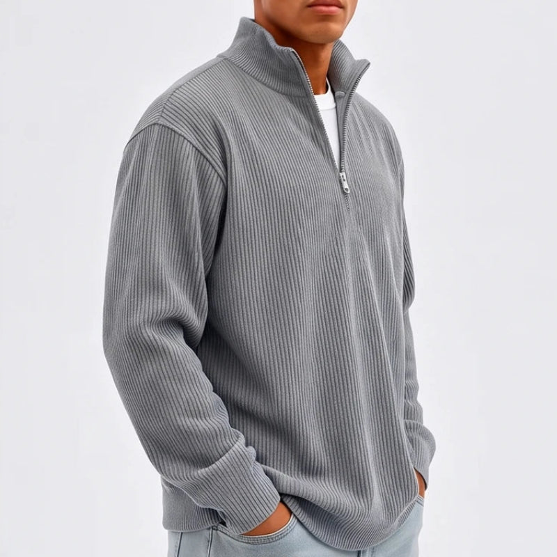 Model wearing Gray corduroy pullover in a studio - 2
