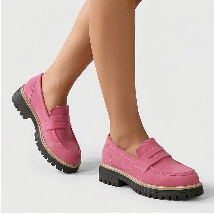 Model wearing Pink Brynn Suede Penny Loafers  [needs new images] in studio