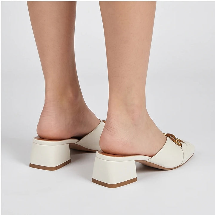 Model wearing White Quincy Genuine Leather Square Toe Mules in studio - 4