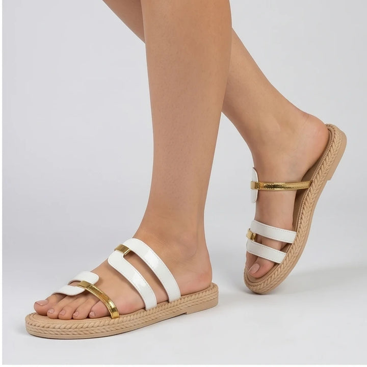 White and gold genuine leather slide sandals with espadrille detailing.