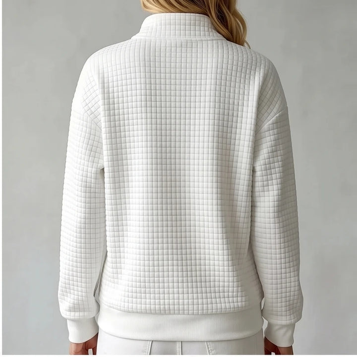 Model wearing Beige knit pullover in a studio - 2
