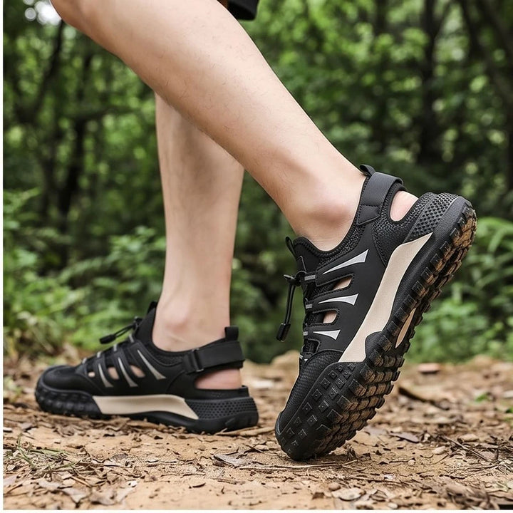 Model wearing Black Colby Mesh Amphibious Sandals outdoors - 2
