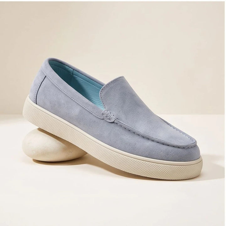 Blue1 suede loafers in a studio background - 3