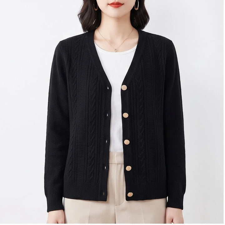Model wearing Black knitted cardigan in a studio