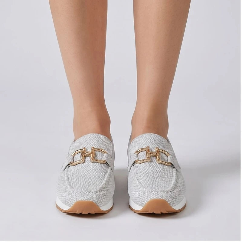 Model wearing White knit loafer in a studio