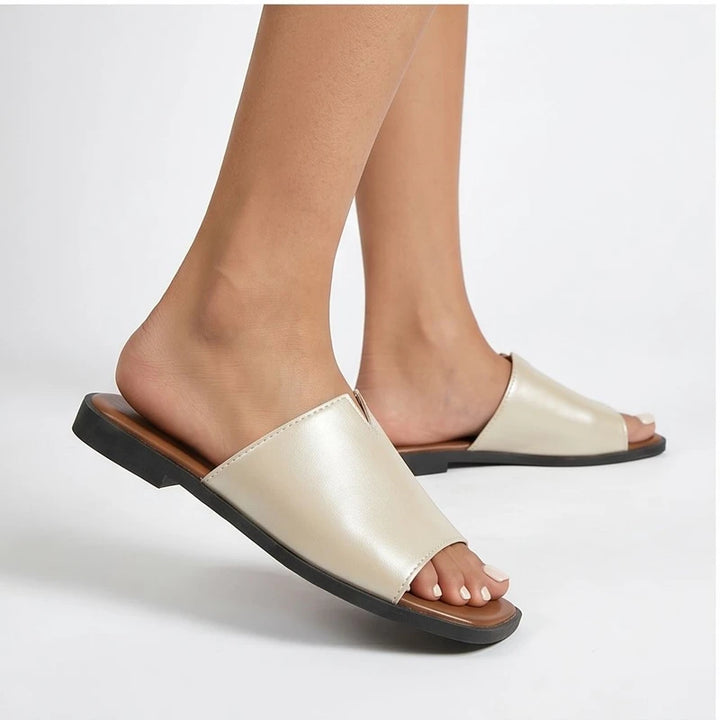 Model wearing Beige Shiny Metallic Flat Slides for Women Square Toe Open Toe Lightweight Comfortable Summer Beach Casual Daily Walking Shoes in studio - 3