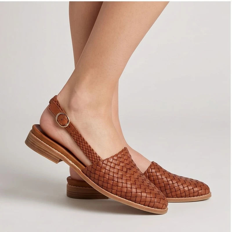Model wearing Brown woven loafers in a studio - 2
