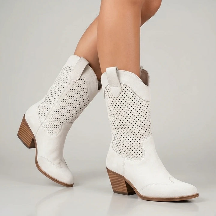Model wearing White Gideon Suede Western Ankle Boots in studio