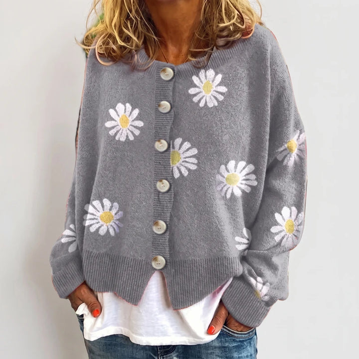 Gray knit cardigan on an off-gray studio background
