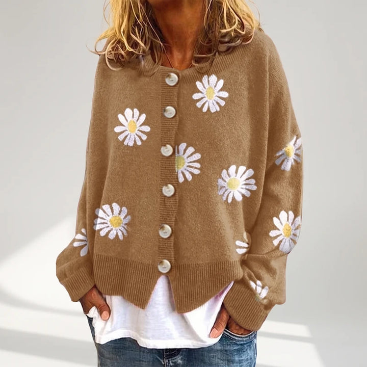 Khaki knit cardigan on an off-gray studio background