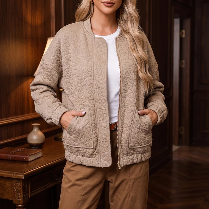 Khaki jacket in a dark wood interior