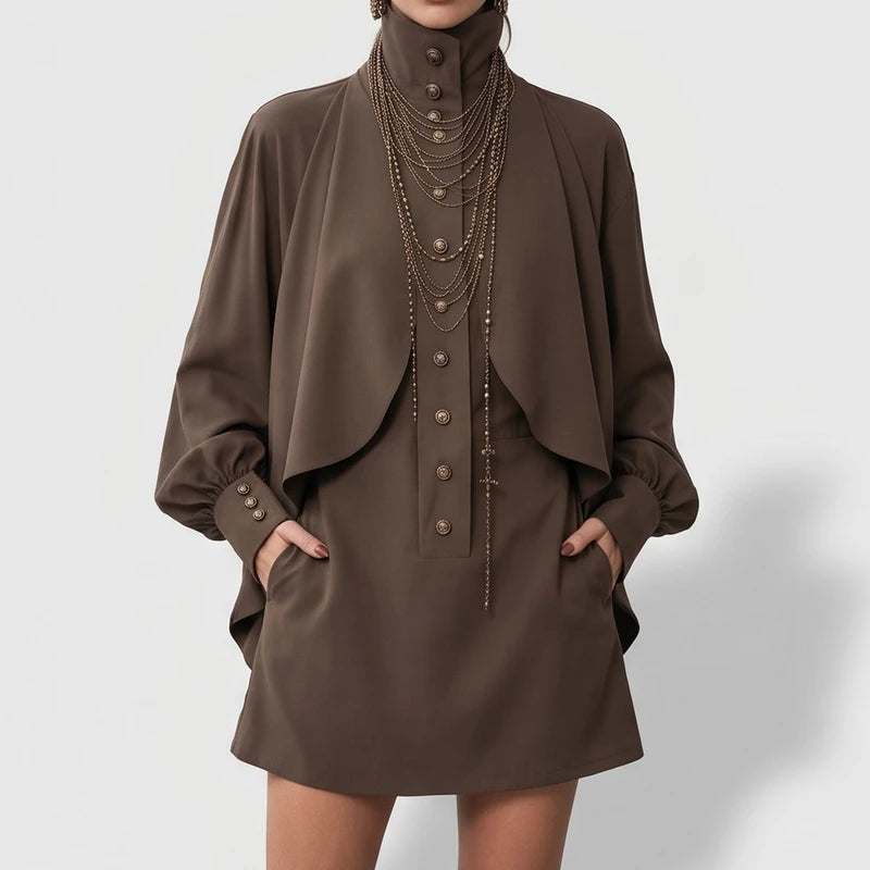 Chocolate dress on an off-gray studio background