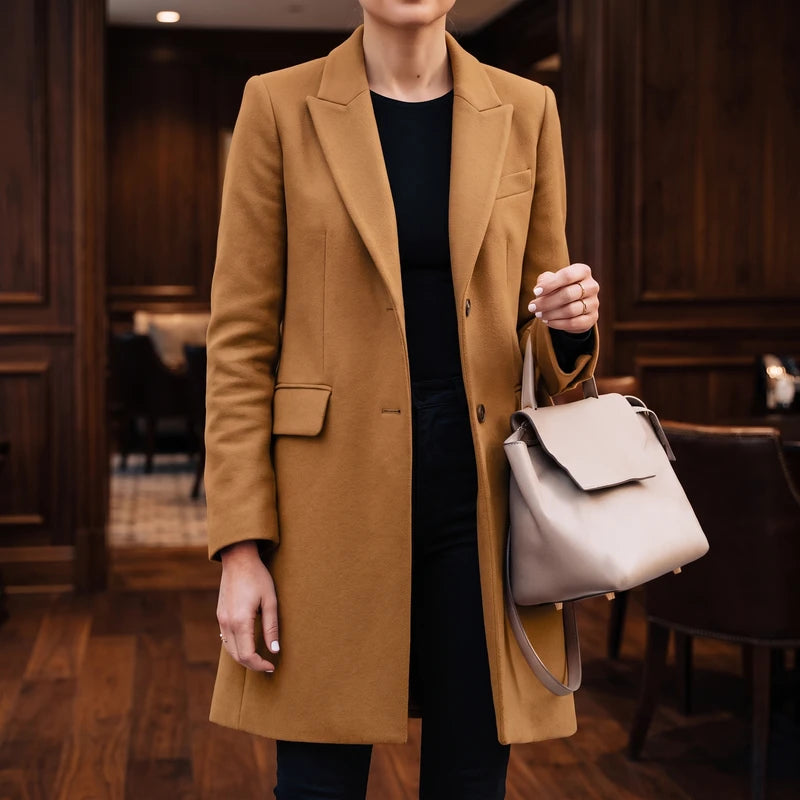 Brown blazer in a dark wood interior