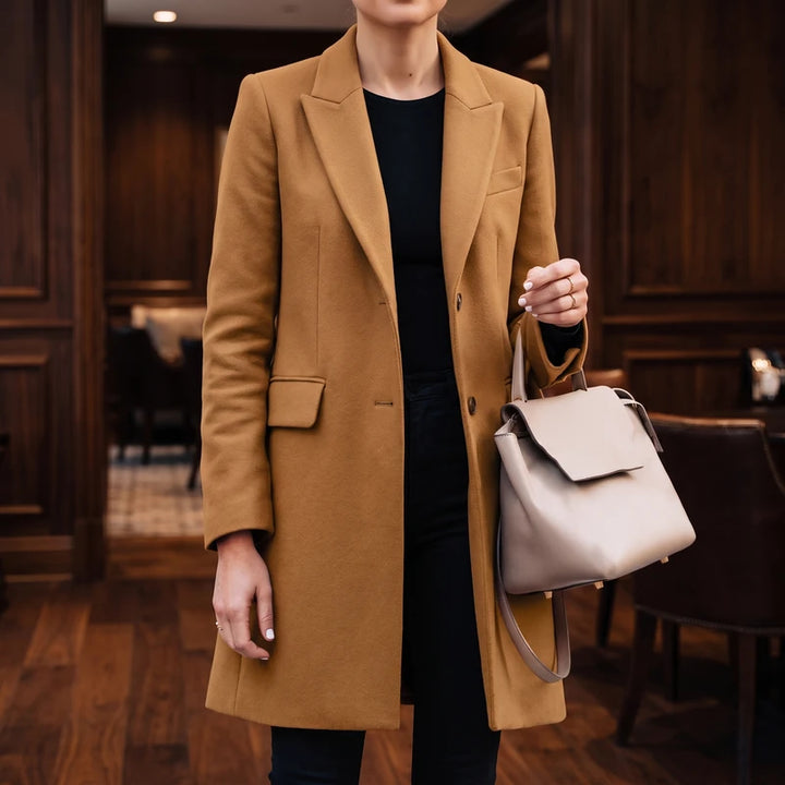 Brown blazer in a dark wood interior
