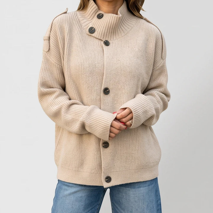 Apricot knit cardigan on an off-gray studio background - 2