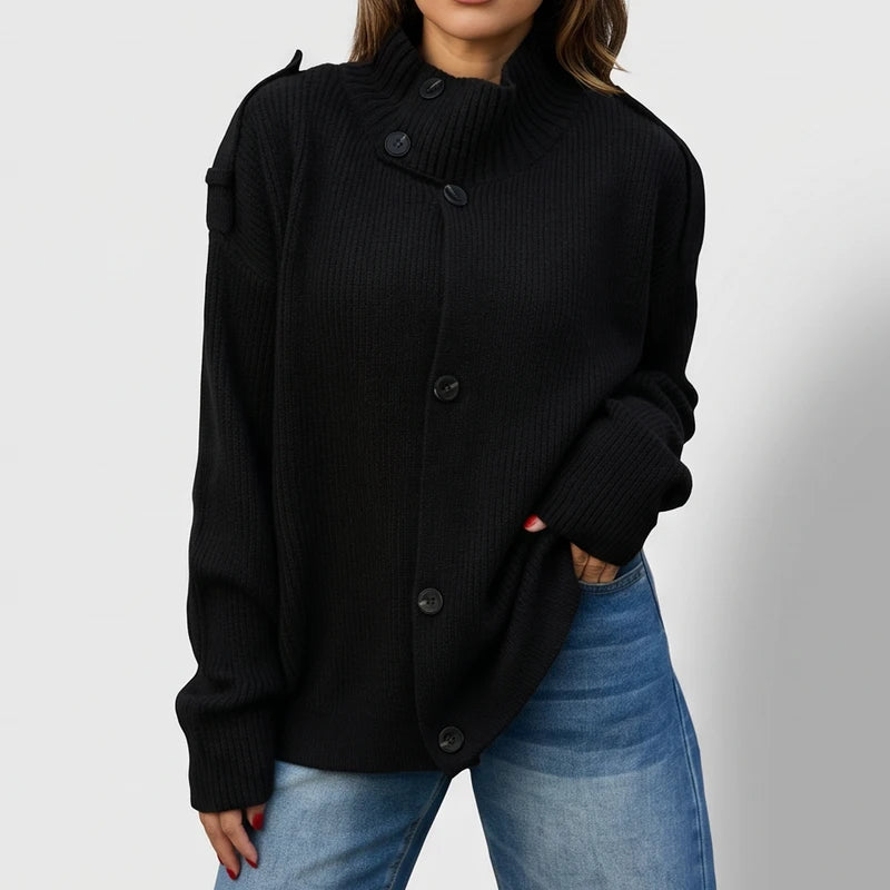 Black knit cardigan on an off-gray studio background - 2