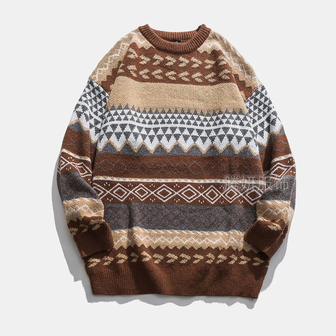 Flat lay of a brown, beige, grey, and white knit sweater with a geometric patterned design and crew neck.