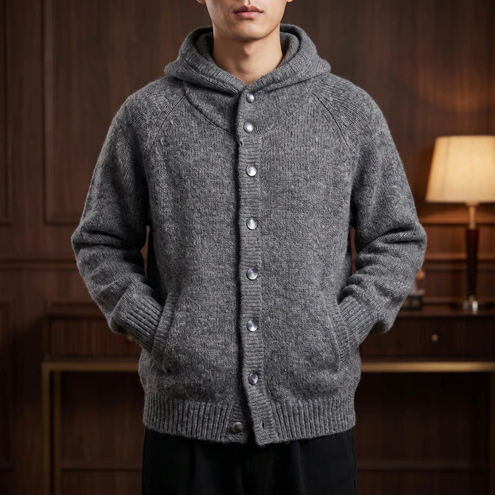 Gray knit hoodies in a dark wood interior