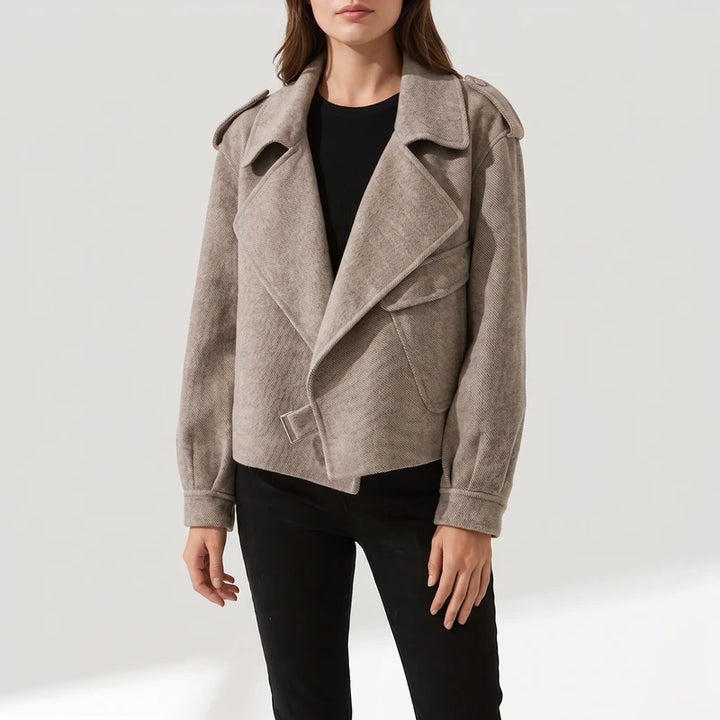 Taupe jacket on an off-gray studio background