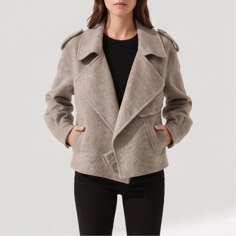 Taupe jacket on an off-gray studio background