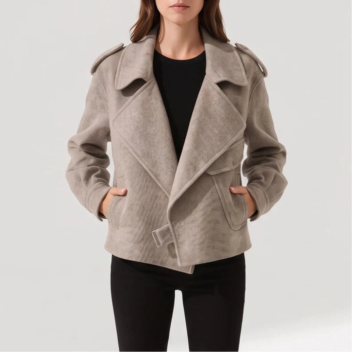 Taupe jacket on an off-gray studio background