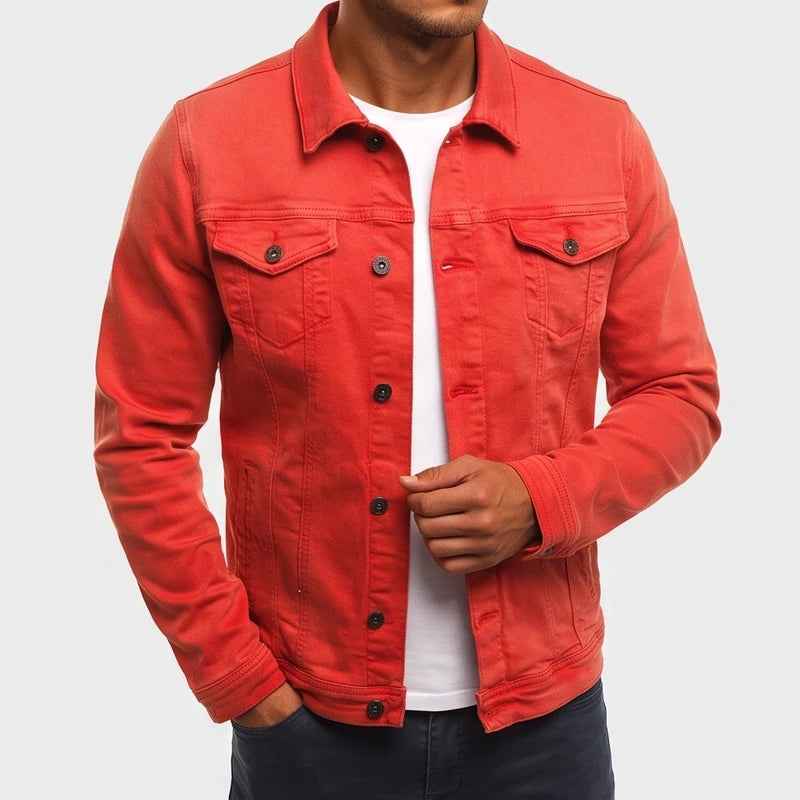 Man wearing a vibrant red long sleeve denim jacket with dark buttons, chest pockets, and side pockets.