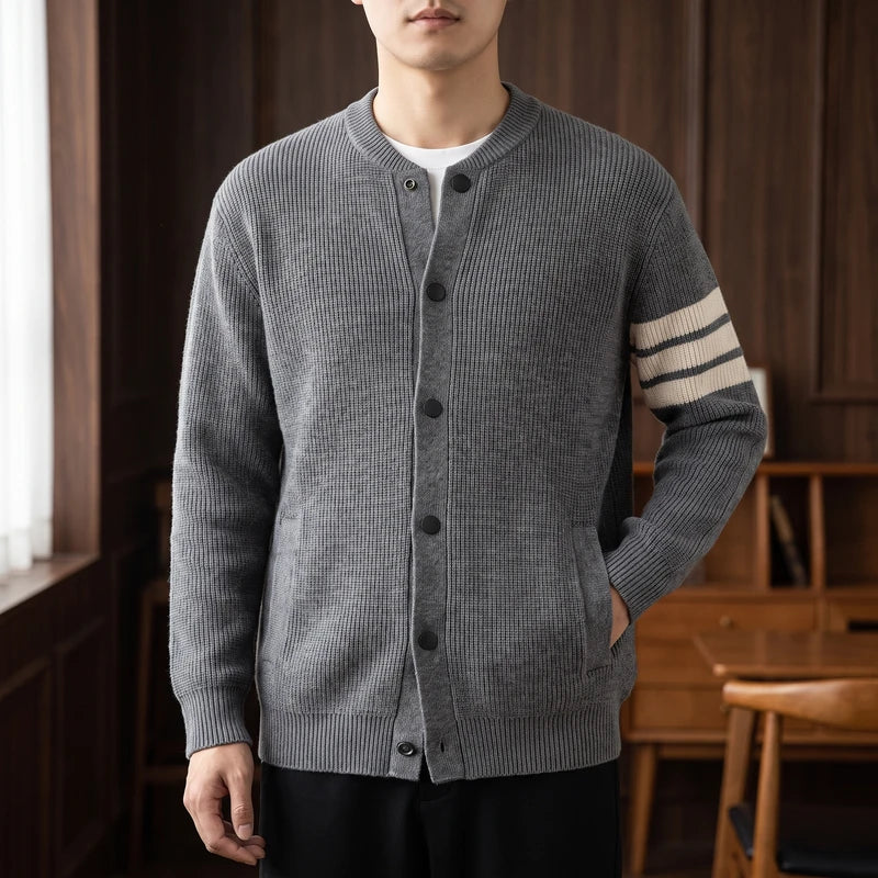 huise knitted cardigan in a dark wood interior