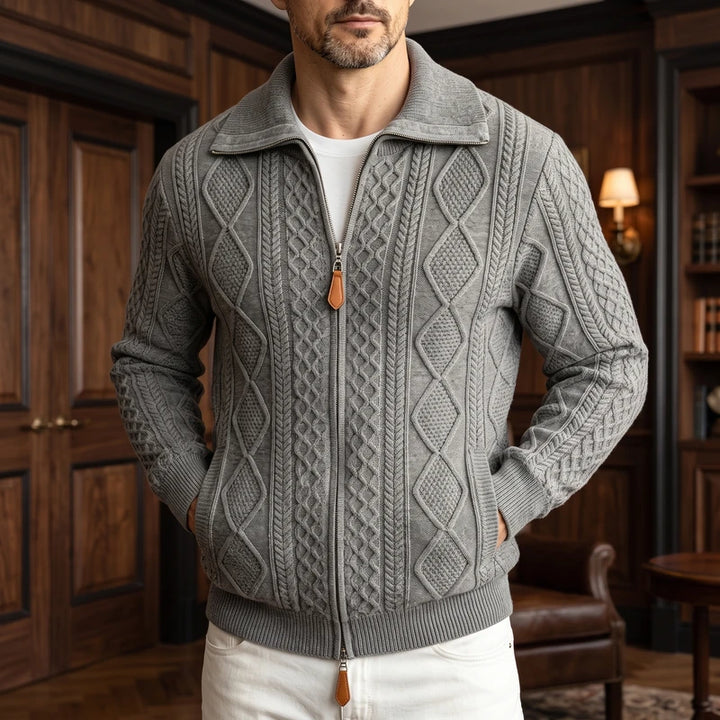 Gray knit cardigan in a dark wood interior
