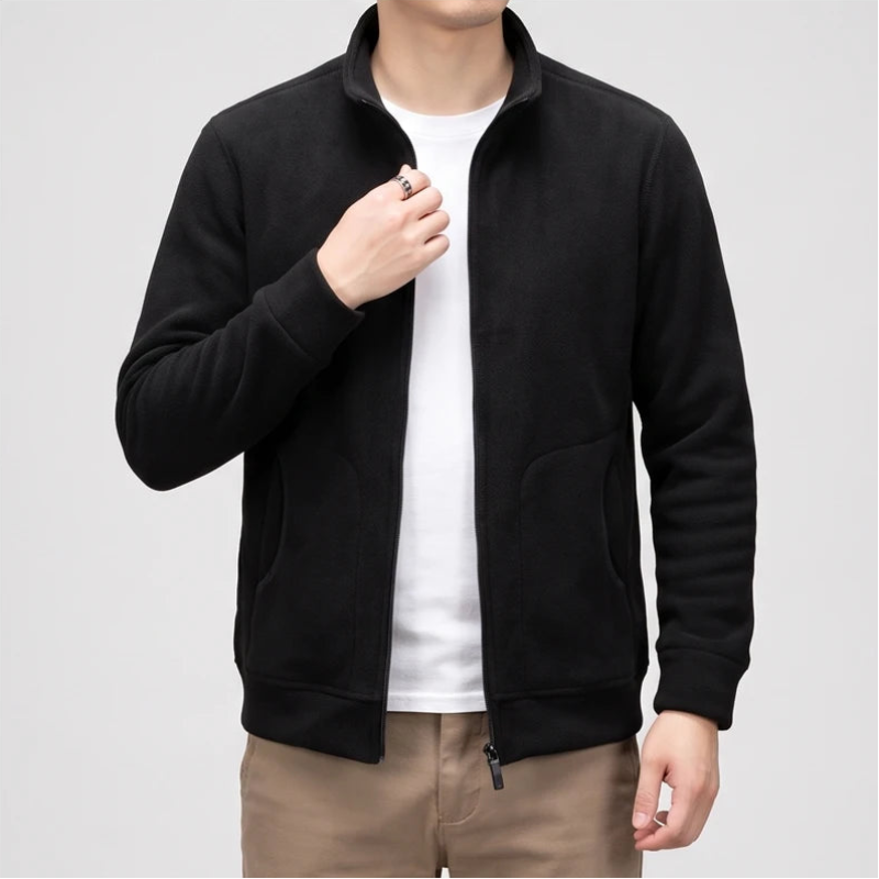 Black fleece jacket on an off-gray studio background - 2