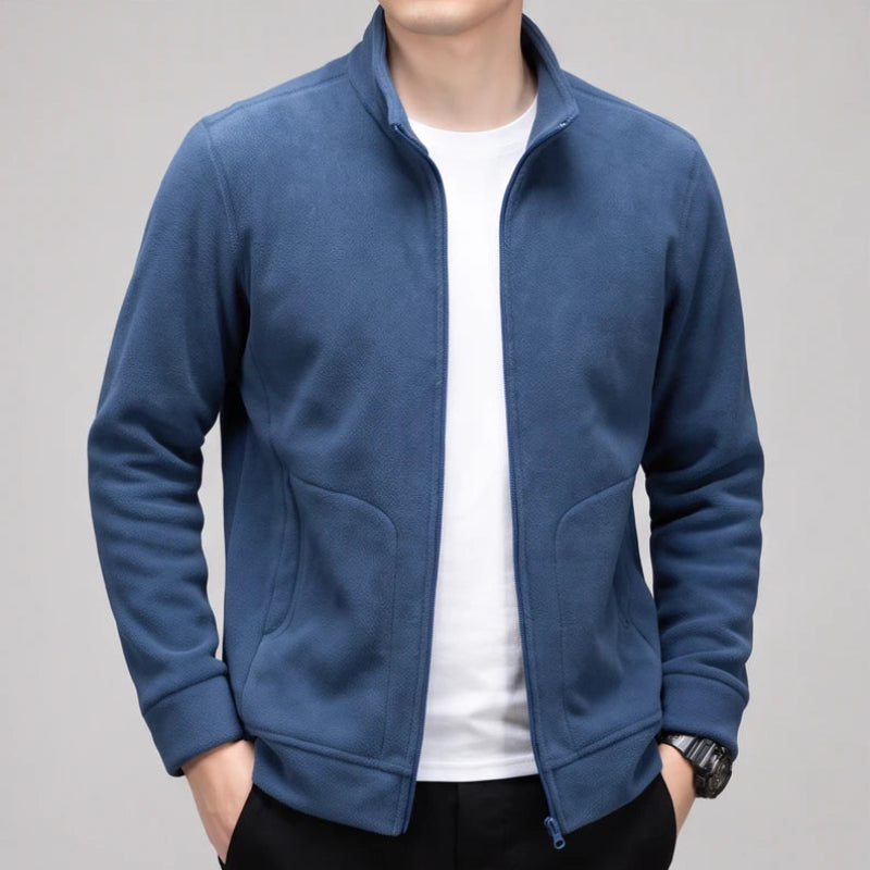Blue fleece jacket on an off-gray studio background - 2