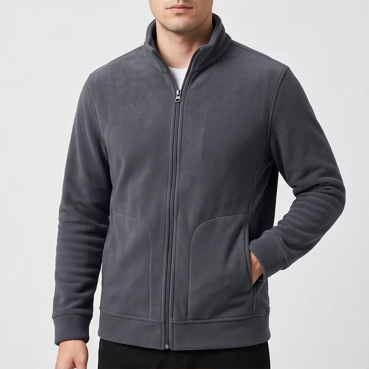 Charcoal Gray fleece jacket on an off-gray studio background