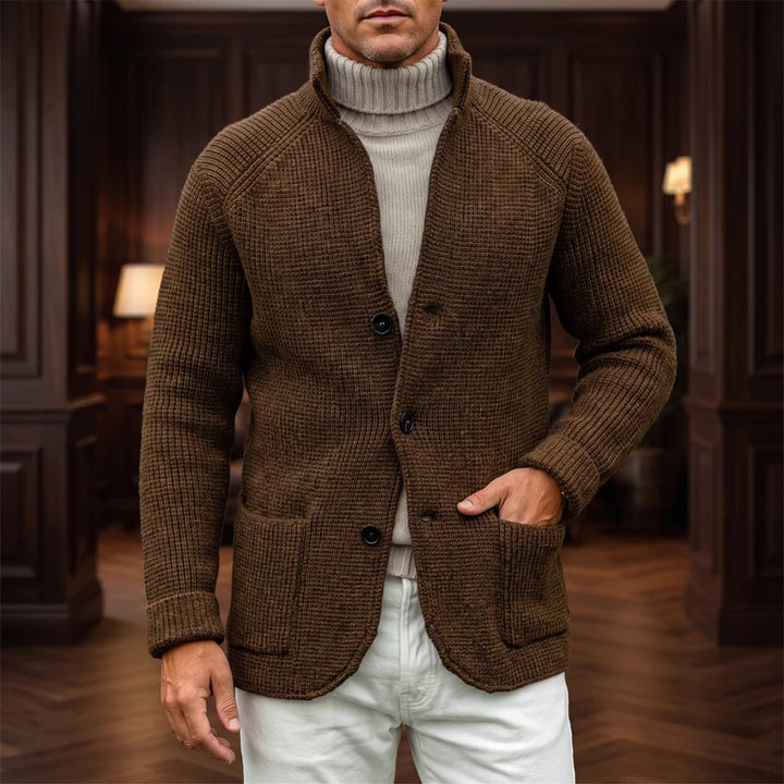 Khaki knit cardigan in a dark wood interior