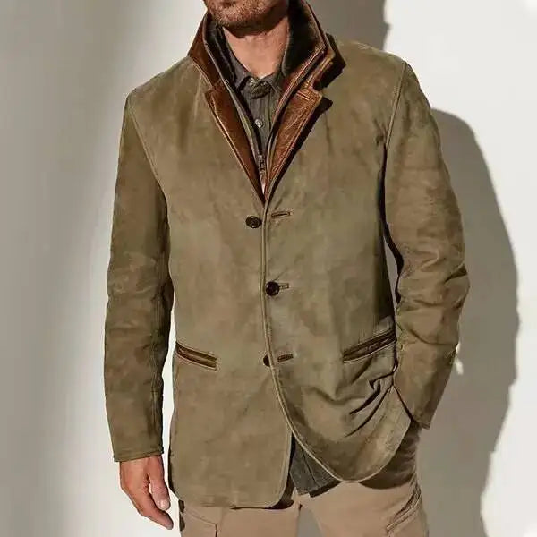 Man wearing a rustic olive green suede jacket with a brown leather collar and three dark buttons.