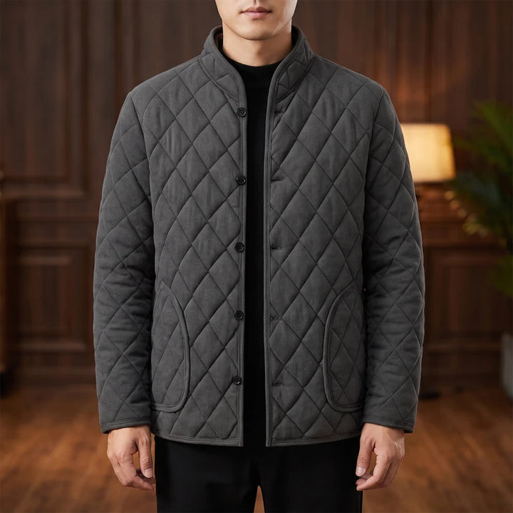 Black fleece jacket in a dark wood interior