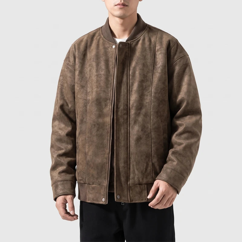 Brown suede jacket on an off-gray studio background