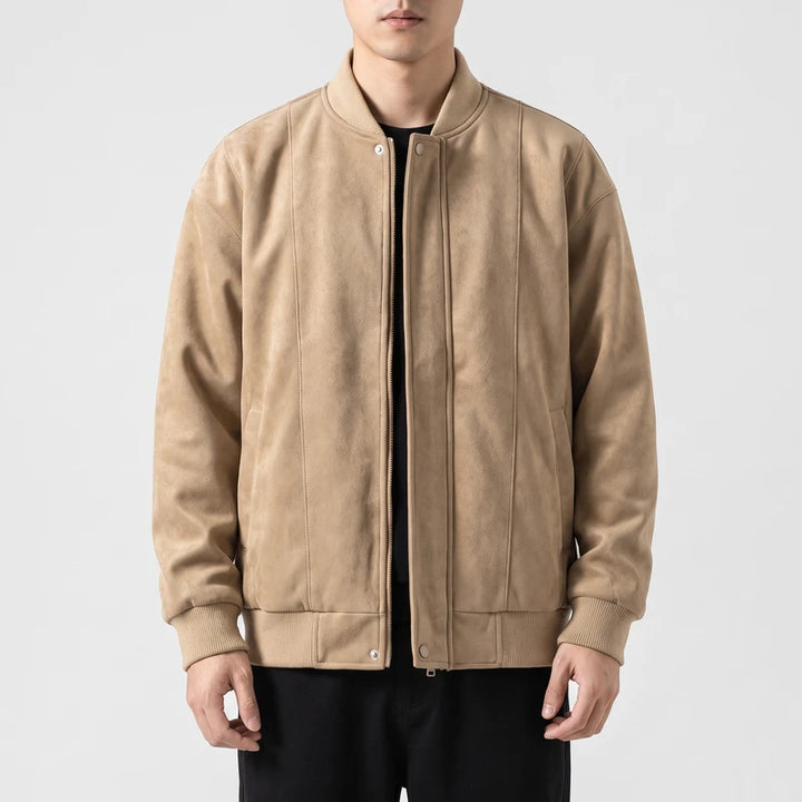 Khaki suede jacket on an off-gray studio background