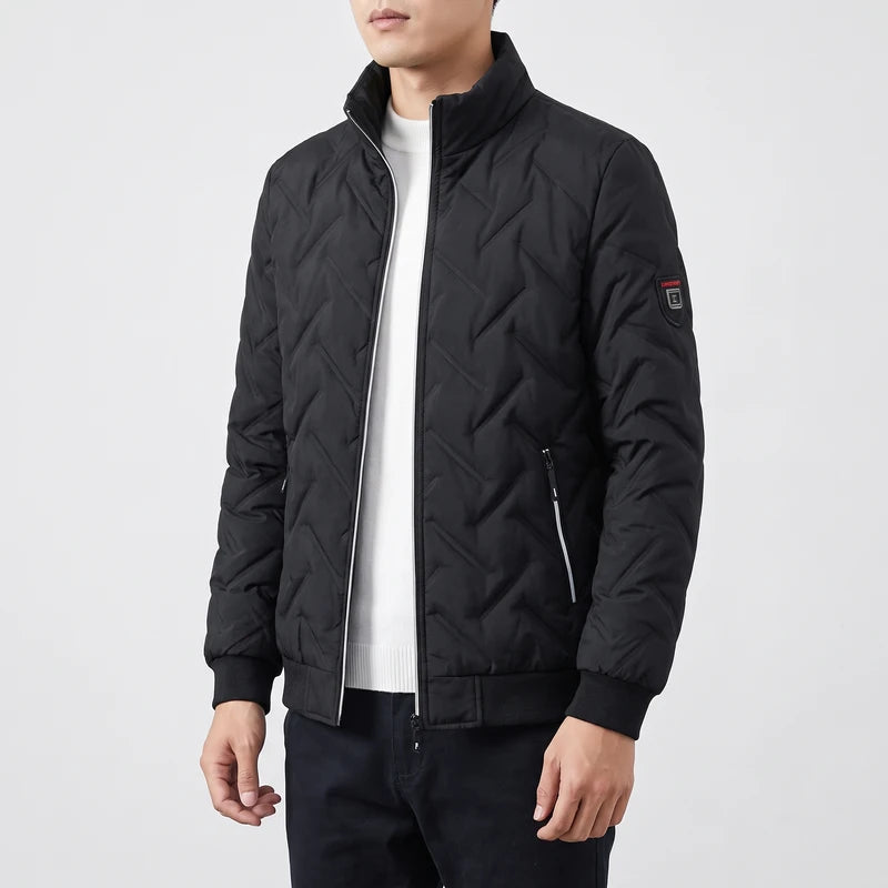 Black coats on an off-gray studio background