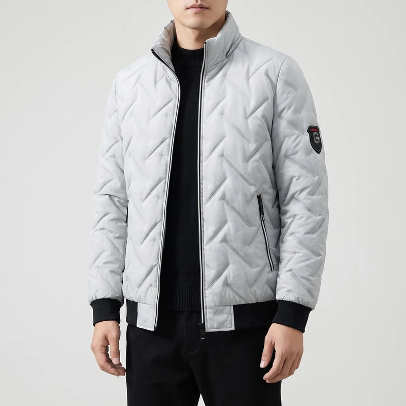 Gray coats on an off-gray studio background