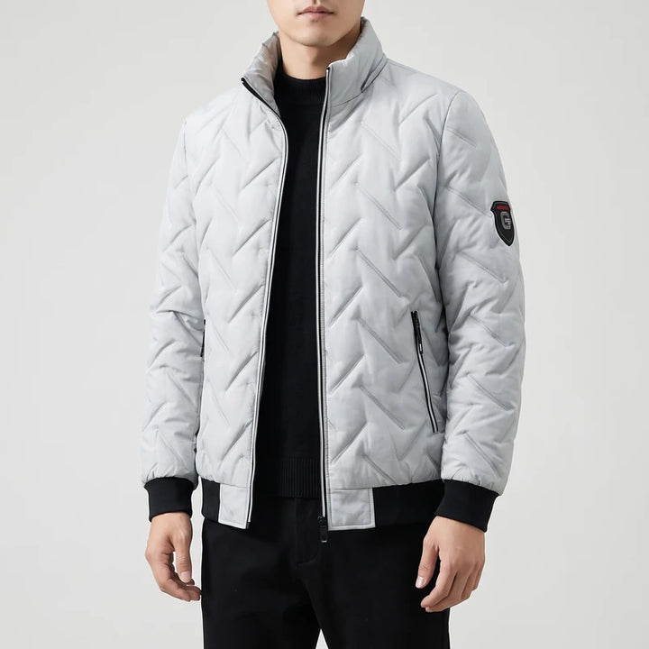 Gray coats on an off-gray studio background