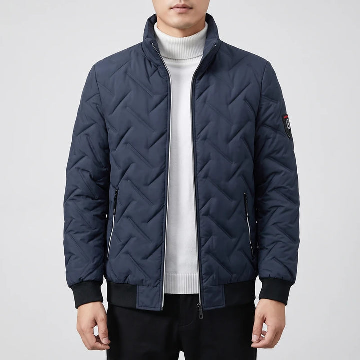 Navy Blue coats on an off-gray studio background